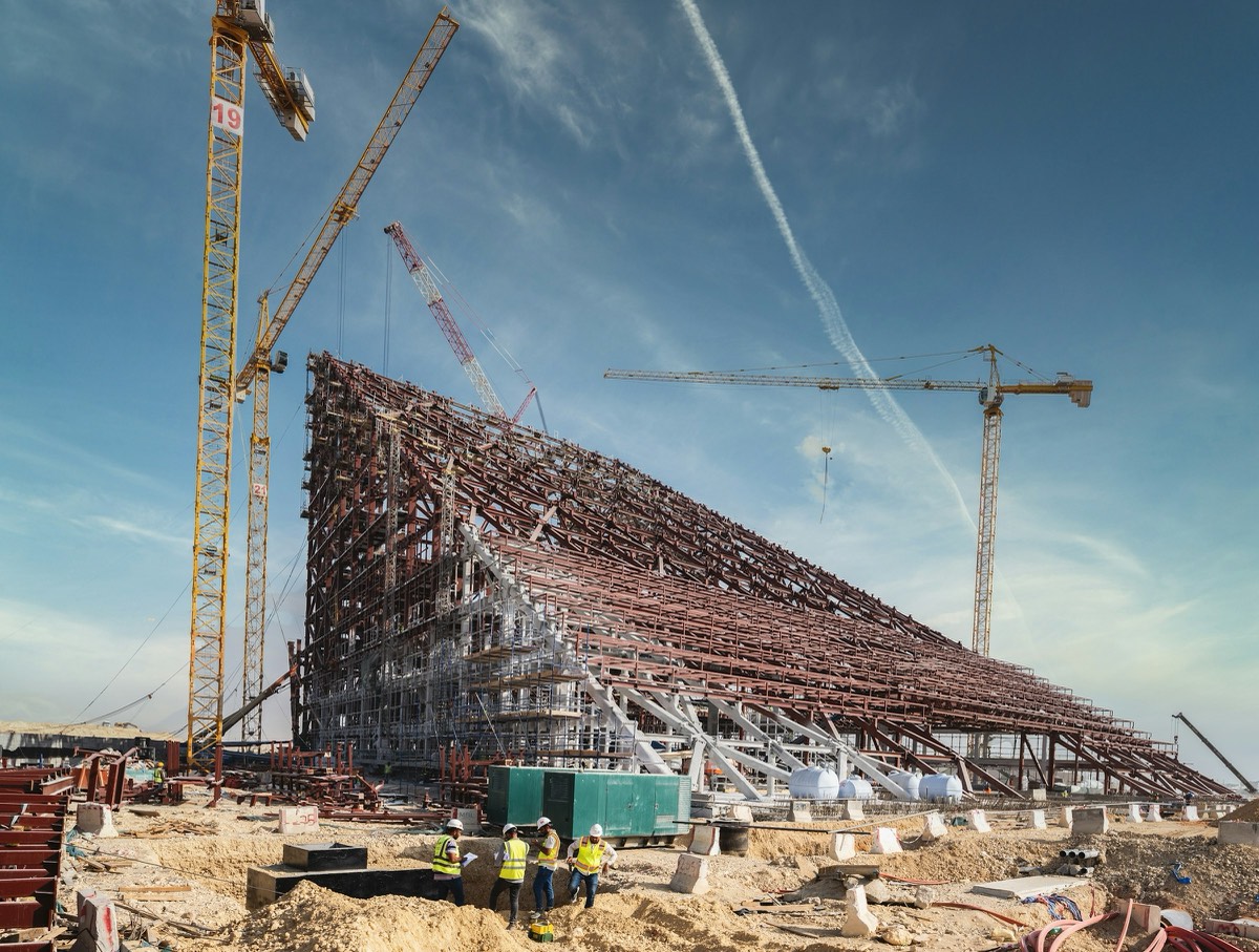 A construction site with cranes