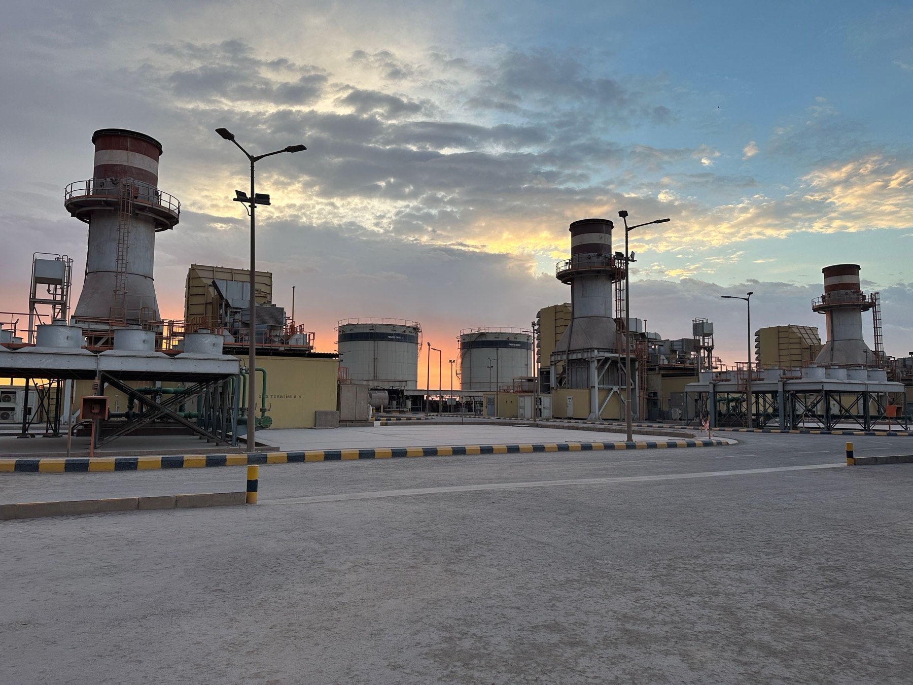 An industrial plant at sunrise